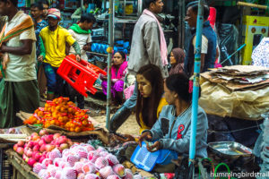 Burmese women vendor with white face painting