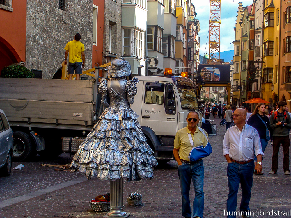 Young lady in silver, a beggar