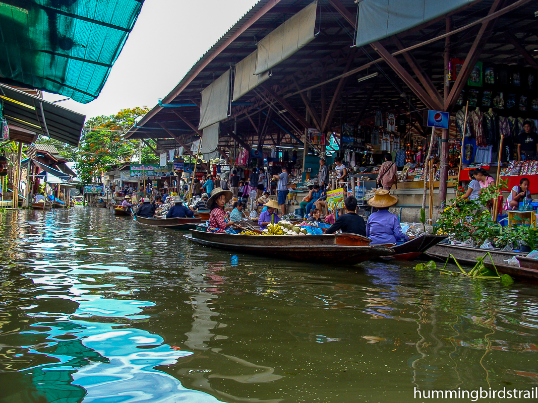 Shops on boats as well as on the bank